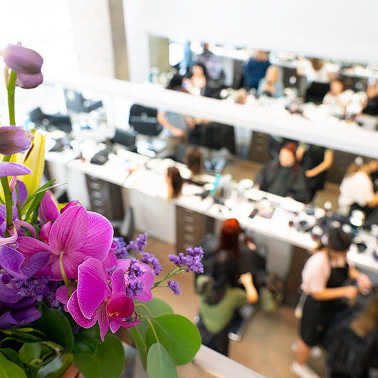 View from CurliQue Store into Q&A Salon where Hairstylists are Working